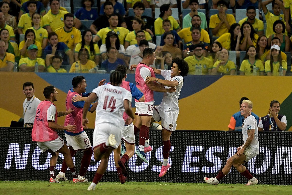 <i>Pedro Vilela/Getty Images</i><br/>Venezuela's players celebrate Bello's goal.