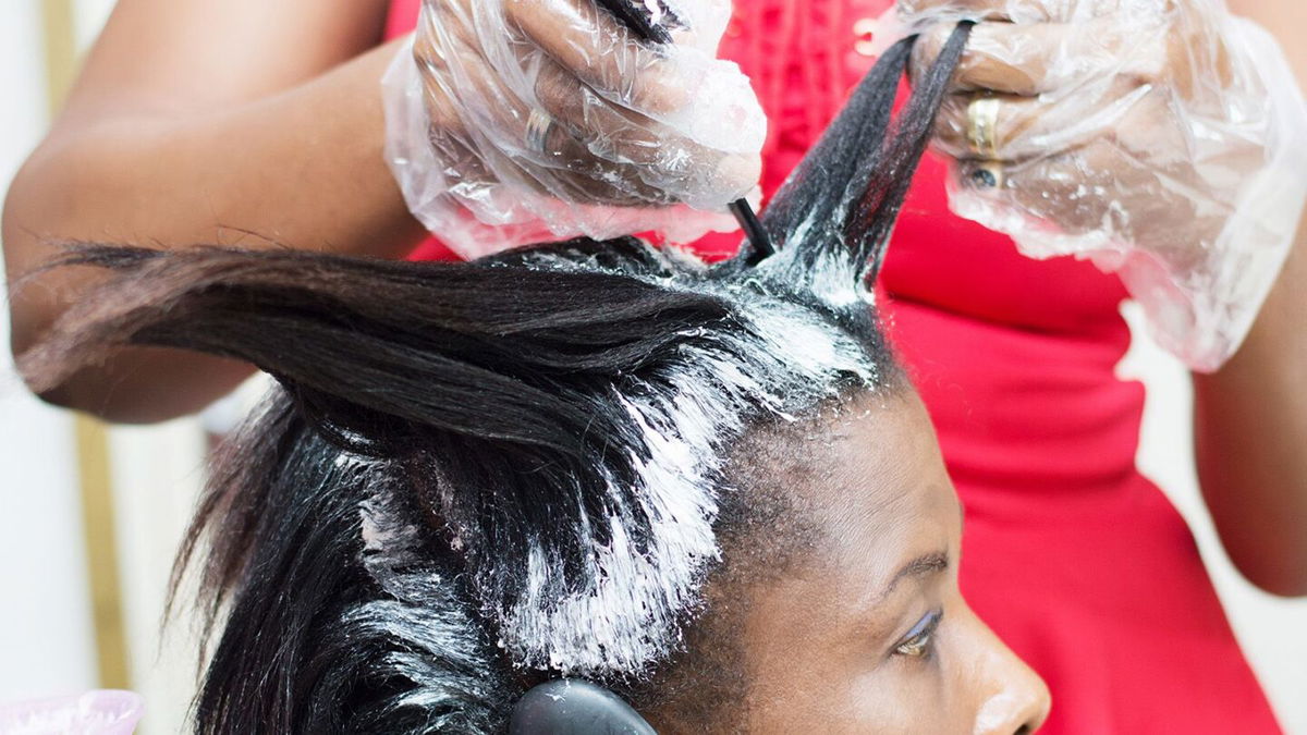 The US Food and Drug Administration is proposing to ban certain hair-straightening products, such as chemical relaxers and pressing products, that have been linked to health risks.	