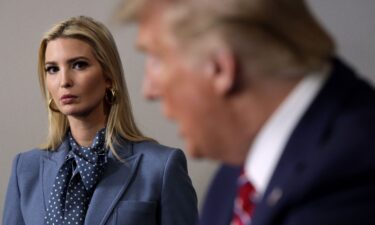 President Donald Trump speaks as his daughter and senior adviser Ivanka Trump looks on during a news briefing at the White House March 20