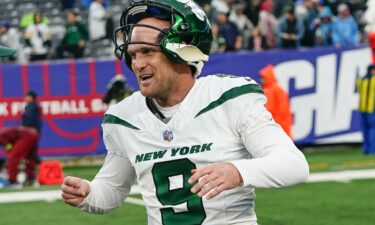 Pineiro celebrates after scoring the game-winning field goal against the Texans.