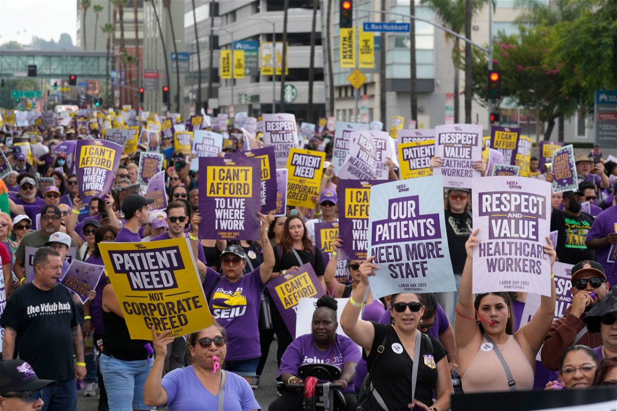 Frontline healthcare workers hold a demonstration on Labor Day outside Kaiser Permanente Los Angeles Medical Center in Hollywood in Los Angeles, September 4.