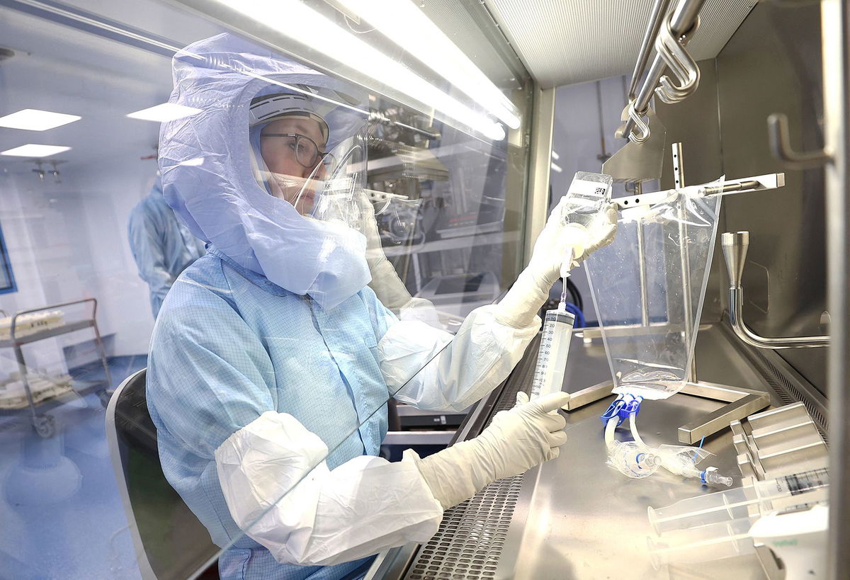 An employee of BioNTech works inside a laboratory at their COVID-19 vaccine production facility as the spread of the coronavirus disease (COVID-19) continues, in Marburg, Germany, in March 2021.