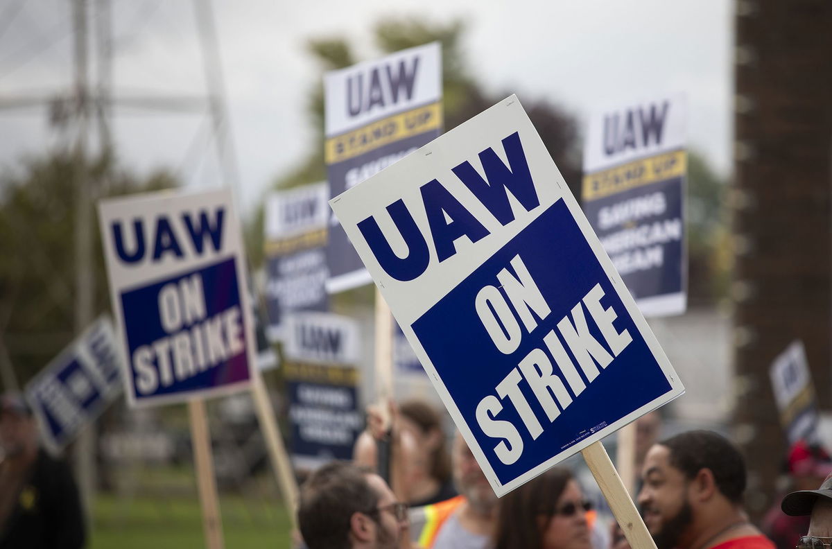 United Auto Workers members strike at the General Motors Lansing Delta Assembly Plant on September 29, in Lansing, Michigan.