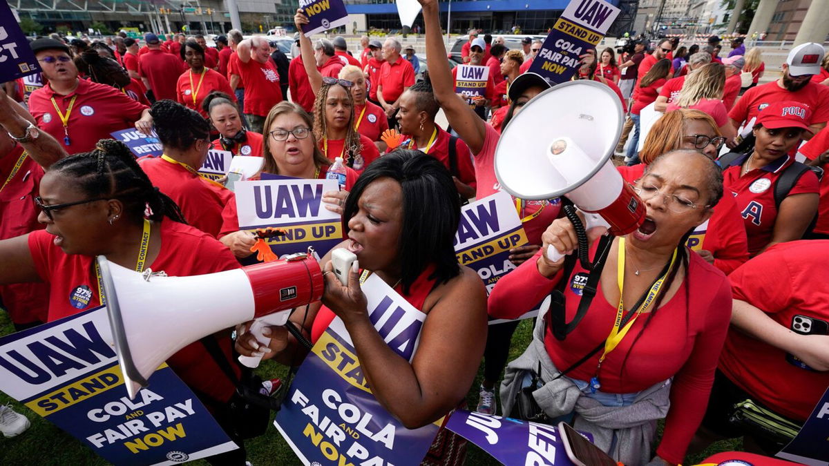 United Auto Workers members attend a rally in Detroit on September 15. From actors to autoworkers, more than 450,000 workers have participated in 312 strikes in the United States this year.