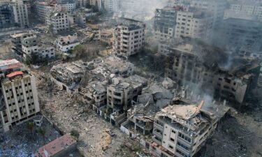 This aerial photo shows heavily damaged buildings following Israeli airstrikes in Gaza City on October 10. Israel is gearing up for the next stage of its war on Hamas.