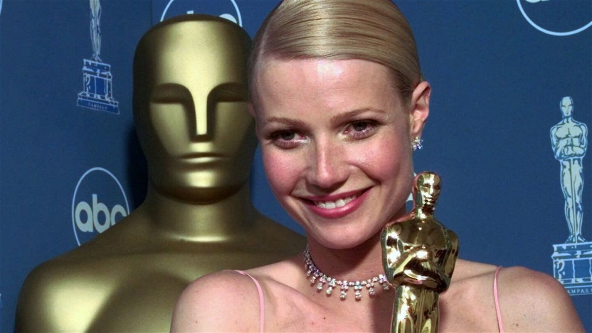Gwyneth Paltrow poses backstage with her best actress Oscar for her role in 