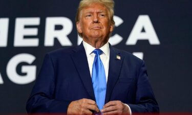 Republican presidential candidate former President Donald Trump arrives to speak at a campaign rally on October 23