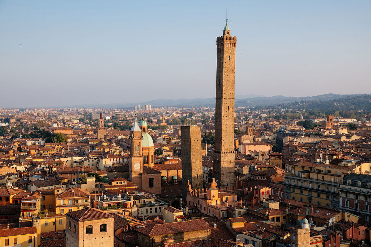 The 'leaning' Garisenda tower and its higher neighbor, the Asinelli sit in the heart of Bologna.