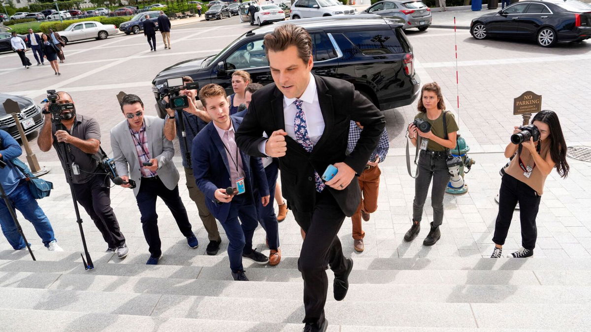 <i>Ken Cedeno/Reuters</i><br/>Rep. Matt Gaetz runs up the East Capitol stairs as the deadline to avert a partial government shutdown approaches on Capitol Hill in Washington