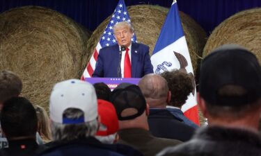 Republican presidential candidate former President Donald Trump speaks to guests during a campaign event at the Dallas County Fairgrounds on October 16 in Adel