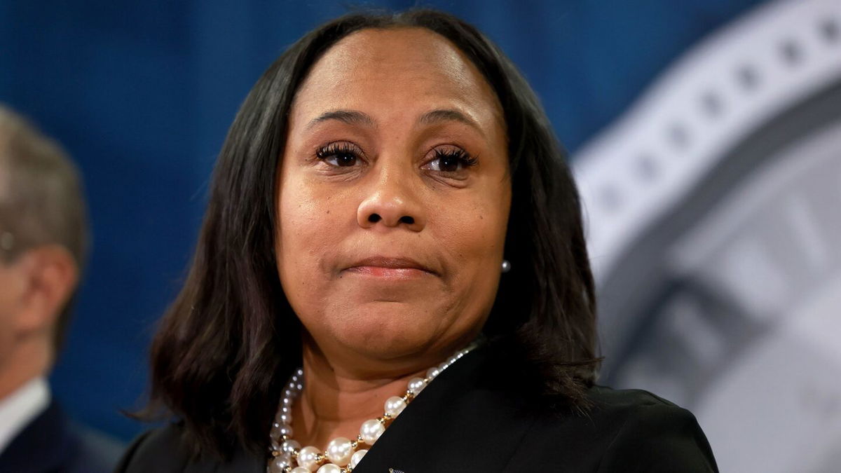 <i>Joe Raedle/Getty Images</i><br/>Fulton County District Attorney Fani Willis speaks during a news conference at the Fulton County Government building on August 14 in Atlanta