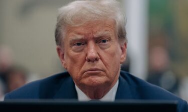 Former President Donald Trump listens during his civil fraud trial at the State Supreme Court building in New York on October 4.