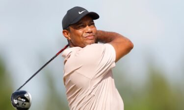 Tiger Woods of the United States plays his shot from the fourth tee during the first round of the Hero World Challenge at Albany Golf Course on November 30 in Nassau