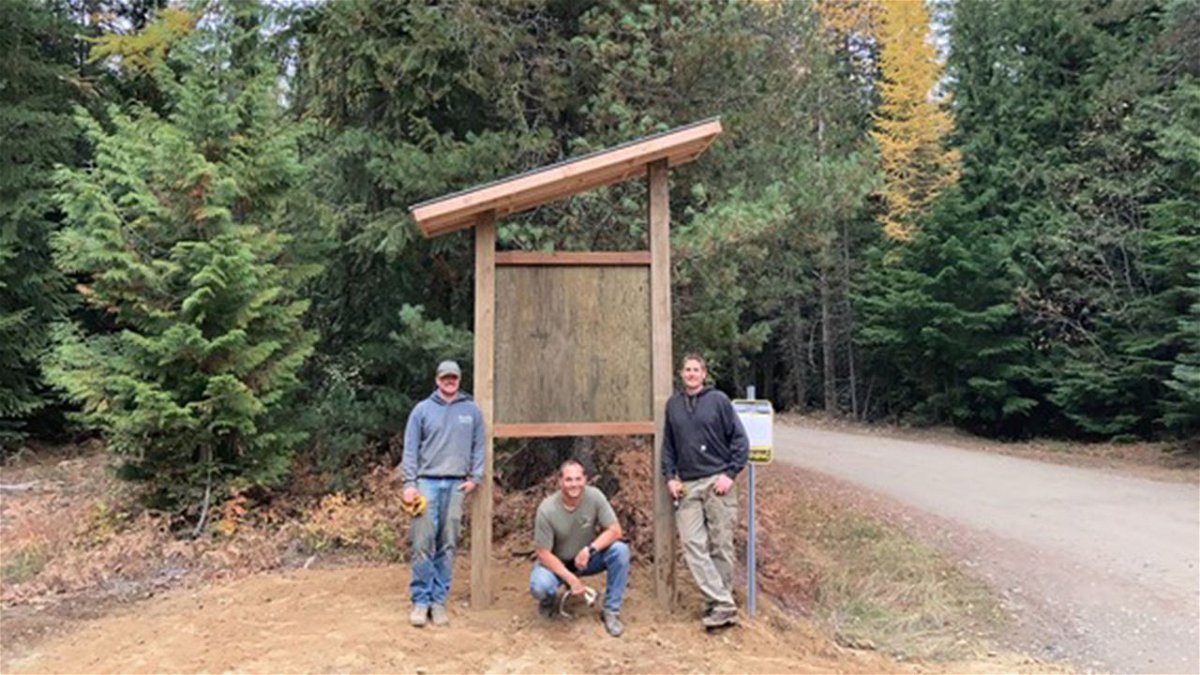 From left to right, Sean Hanley, IDPR trail cat operator, Todd Wernex, IDL Recreation Program Manger, Nate Sparks, IDPR North Idaho trails specialist with the Ruby Creek Information Kiosk, Boundary County.