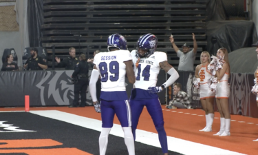 Wildcat players celebrate touchdown in Weber State's 33-21 win over Idaho State