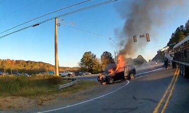 A Rome Police Department officer is being recognized after he helped free a mother and her son from their car just moments before it burst into flames