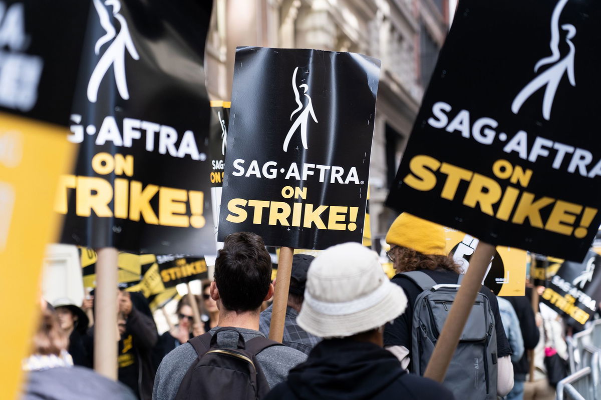 <i>Meir Chaimowitz/NurPhoto/Shutterstock</i><br/>SAG-AFTRA picketers gathered for their 75th day of striking for better working conditions and contracts in front of Netflix studios in New York on September 27. Hollywood actors have reached a tentative agreement with the major film and television studios to end a strike