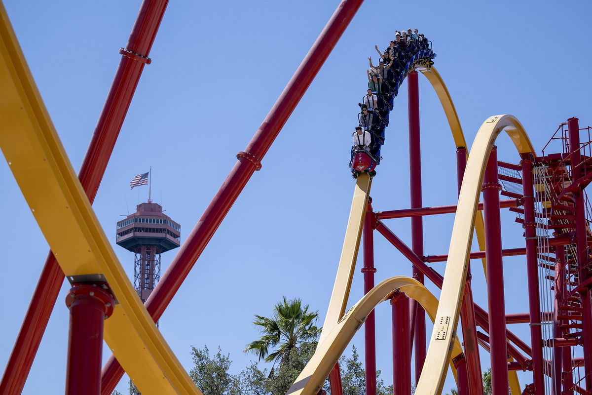 Amusement parks Six Flags and Cedar Fair are merging. Pictured is Six Flags Magic Mountain in California in a 2022 photo.