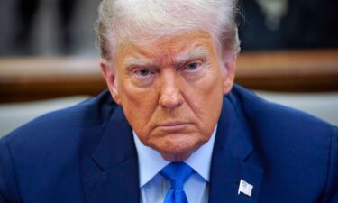 Former President Donald Trump waits to take the witness stand at New York Supreme Court on November 6.