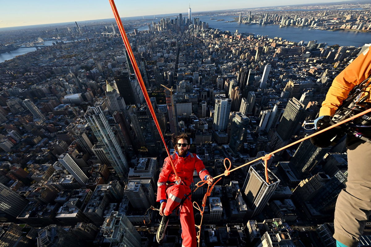 Jared Leto climbing the Empire State Building.