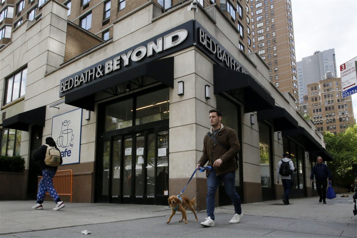 People walk near a closed store of Bed Bath & Beyond on April 24, in New York City.