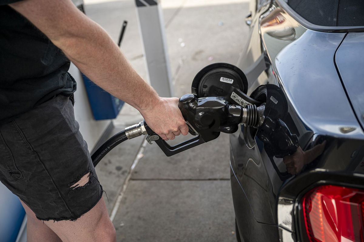 Gas prices could fall further. A customer refuels at a Chevron gas station in San Francisco, on Tuesday, November 21.