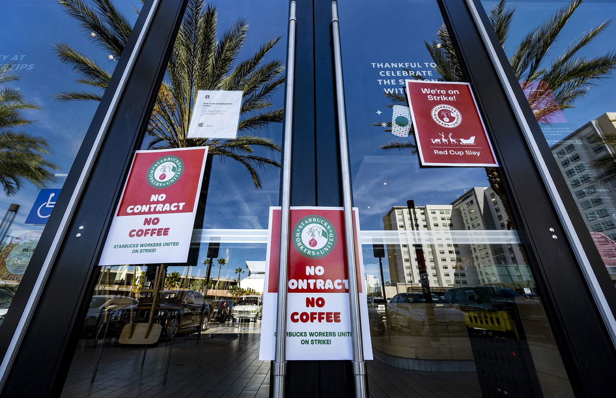 <i>Mark Rightmire/MediaNews Group/Orange County Register/Getty Images</i><br/>Signs are posted on the door of a closed unionized Starbucks Coffee in Anaheim