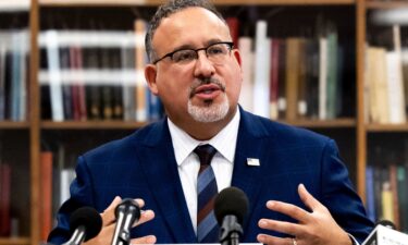 Education Secretary Miguel Cardona speaks with students during a visit to Towson University to discuss antisemitism on college campuses on November 2.