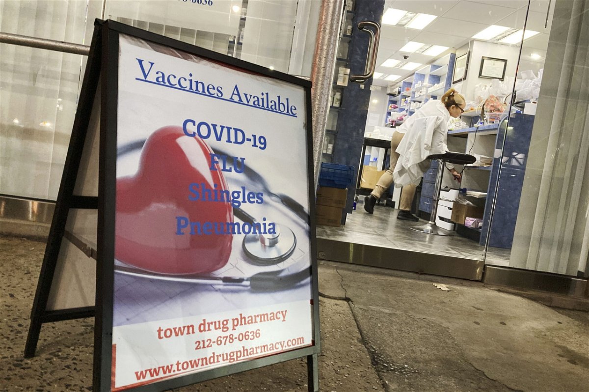 <i>Ted Shaffrey/AP</i><br/>A pharmacy in New York City offers vaccines for Covid-19