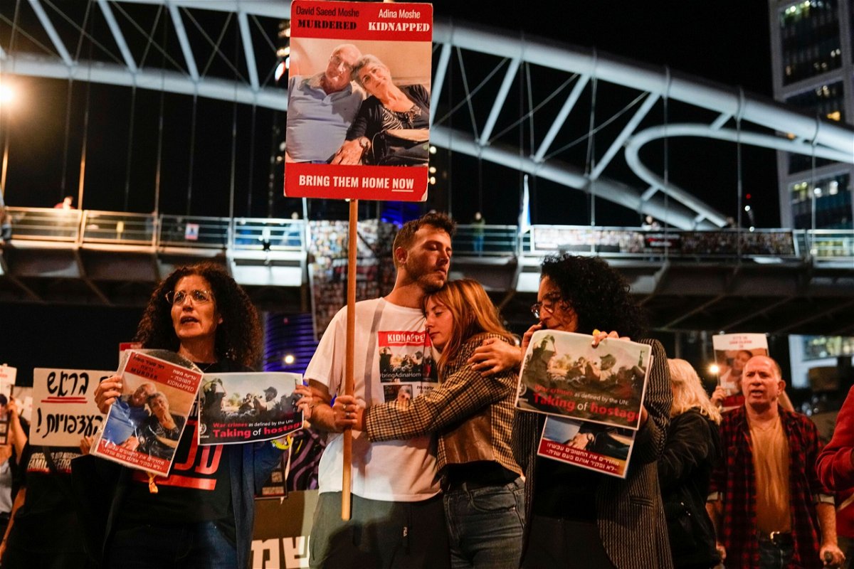 <i>Ariel Schalit/AP</i><br/>Families and friends of hostages held by Hamas in Gaza call for the Israeli Prime Minister Benjamin Netanyahu to bring them home during a demonstration in Tel Aviv