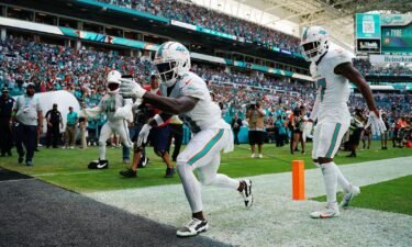 Tyreek Hill of the Miami Dolphins celebrates a touchdown during the first half in the game against the Carolina Panthers at Hard Rock Stadium on October 15 in Miami Gardens