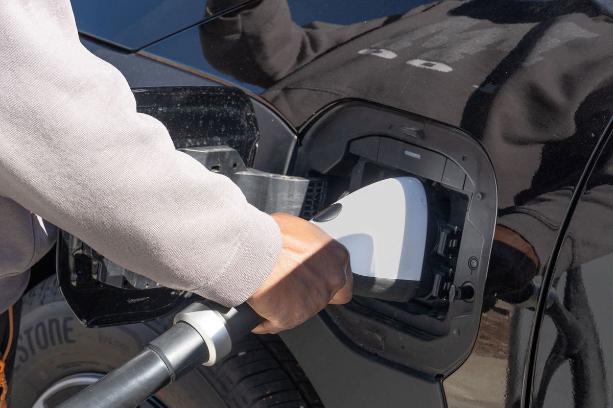 Americans purchased one million fully electric vehicles in 2023. Pictured is an electric vehicle charging station in Colorado.