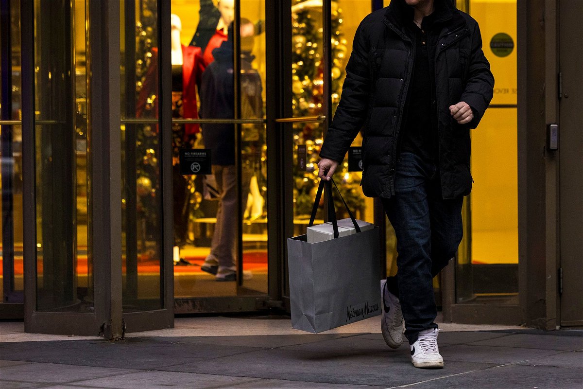 A shopper leaves Neiman Marcus in the Magnificent Mile shopping district of Chicago, Illinois, on December 2.