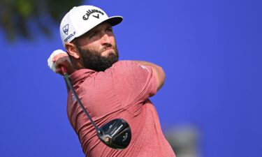 Jon Rahm of Spain tees off on the 14th hole during Day Four of the DP World Tour Championship on the Earth Course at Jumeirah Golf Estates on November 19