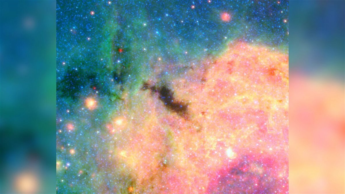 <i>NASA/Caltech/Solange V. Ramirez (NExScI; Caltech)</i><br/>The Spitzer Space Telescope captured a view of a dark cloud called 