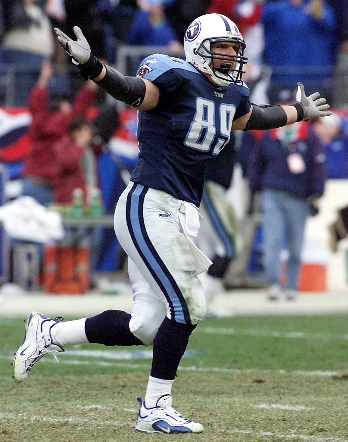 <i>Jeff Haynes/AFP/Getty Images</i><br/>Frank Wycheck of the Tennessee Titans celebrates after Kevin Dyson scored on a kickoff return during an AFC wild card game on January 8