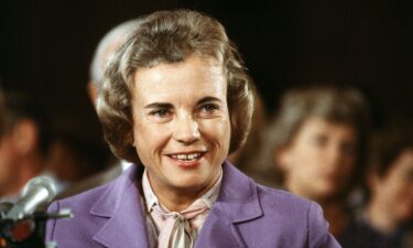 Supreme Court nominee Sandra Day O'Connor smiles during her confirmation hearing before the Senate Judiciary Committee