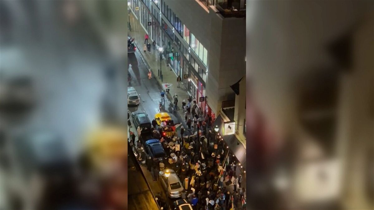 <i>Courtesy @thatJVG</i><br/>A screengrab from a video shows pro-Palestinian demonstrators outside Goldie falafel shop in Philadelphia on Sunday night.