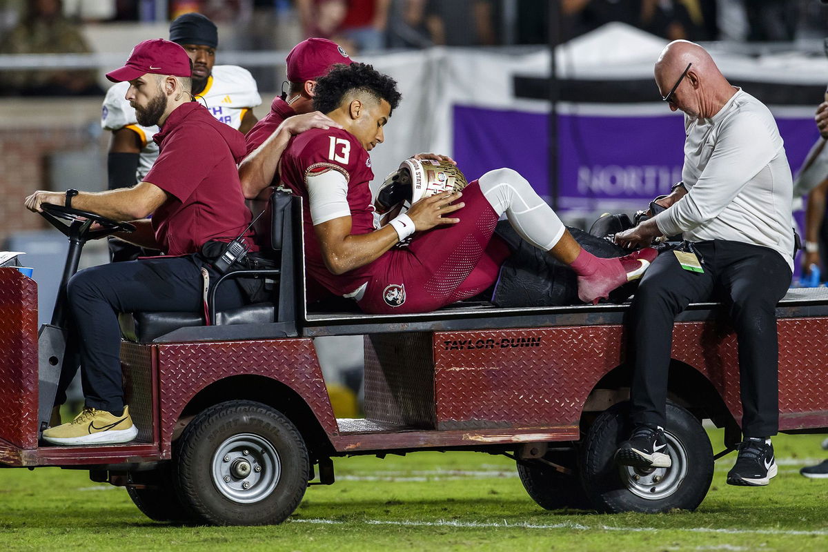 <i>Isaiah Vazquez/Getty Images</i><br/>Lawrance Toafili of the Florida State Seminoles celebrates with his teammates after scoring a touchdown in the third quarter against the Louisville Cardinals during the ACC championship game.