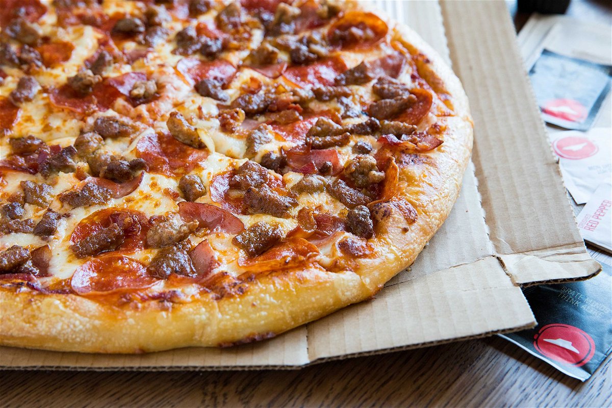 A view of a Pizza Hut Hand Tossed Meat Lover's pizza.