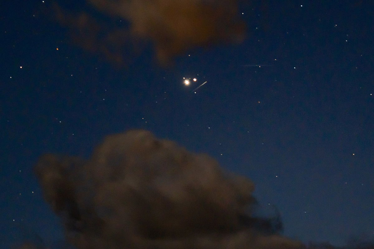 Ursid meteors are seen alongside Jupiter and Saturn's great conjunction in 2020 over Ashland, Oregon. This year, the Ursids will peak on the night of December 21 through the early morning of December 22.