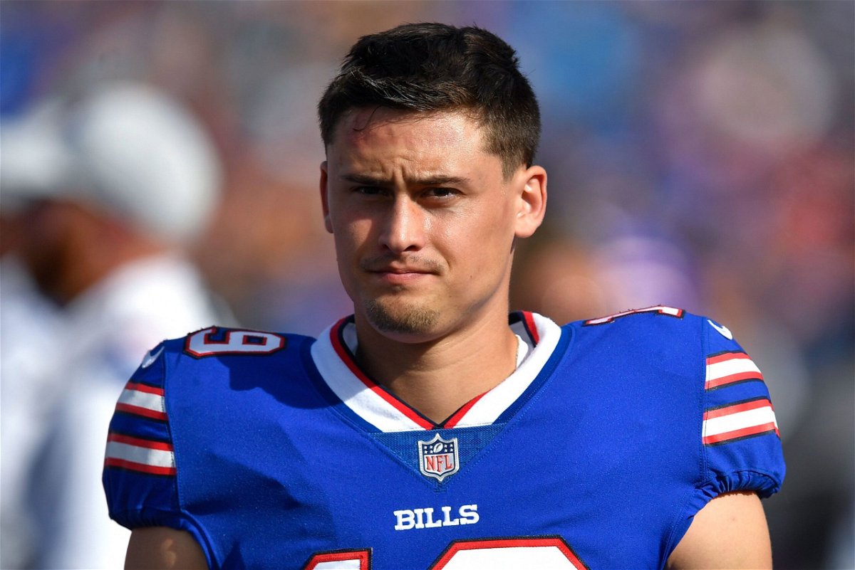 <i>Adrian Kraus/AP</i><br/>Then-Buffalo Bills punter Matt Araiza walks on the sideline during the first half of a preseason NFL football game against the Indianapolis Colts in August 2022. Araiza will be dropped from a civil lawsuit accusing him and others of gang rape.
