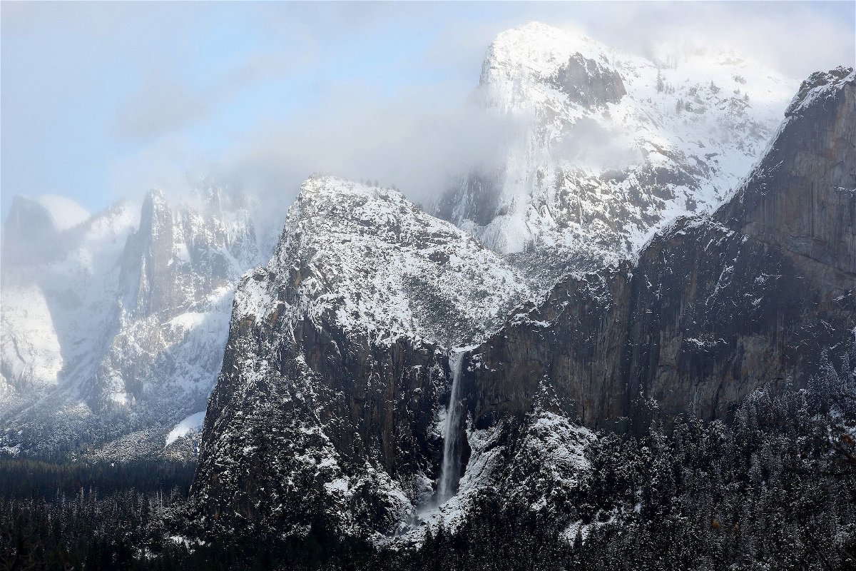 Water flows from Bridalveil Fall (LOWER C) in Yosemite Valley, after the last of a series of atmospheric river storms passed through, on January 19 in Yosemite National Park, California.