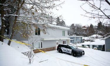 Police tape surrounds the off-campus home where four University of Idaho students were killed in 2022.