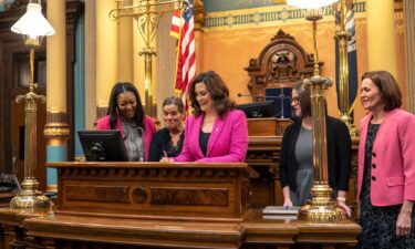 Michigan Gov. Gretchen Whitmer signs the final bill in the Reproductive Health Act on Monday