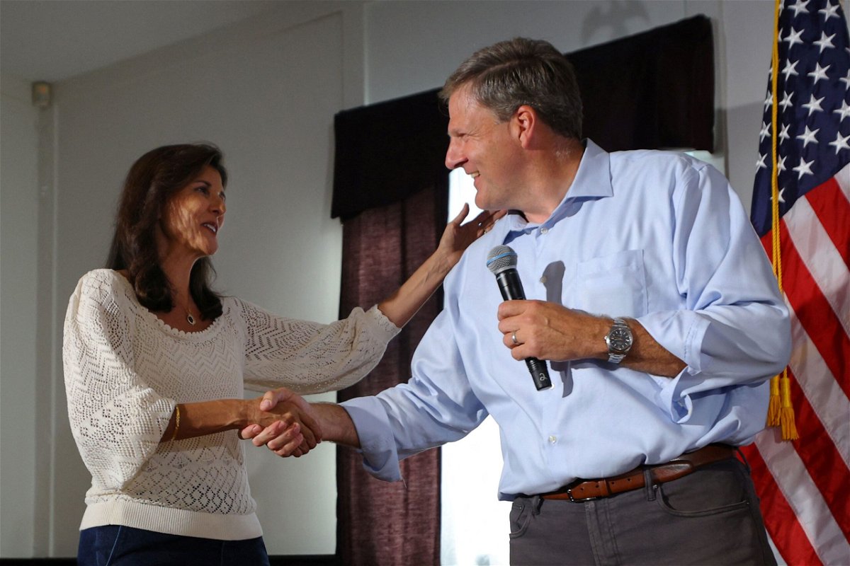 <i>Brian Snyder/Reuters</i><br/>Republican presidential candidate and former U.S. Ambassador to the United Nations Nikki Haley is introduced by New Hampshire Governor Chris Sununu at a campaign town hall meeting in Merrimack