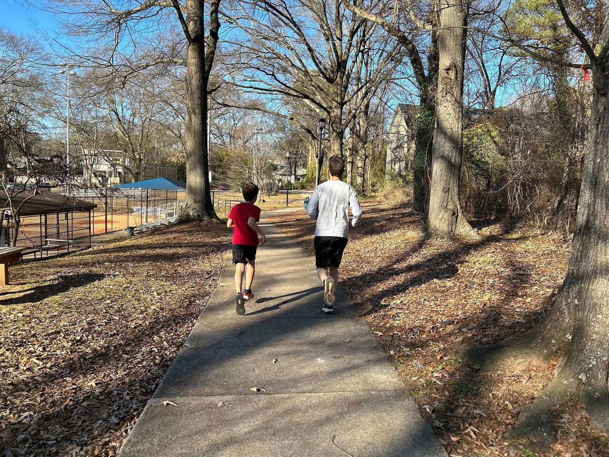 CNN Senior Writer Thomas Lake, right, with his son near their home in metro Atlanta.