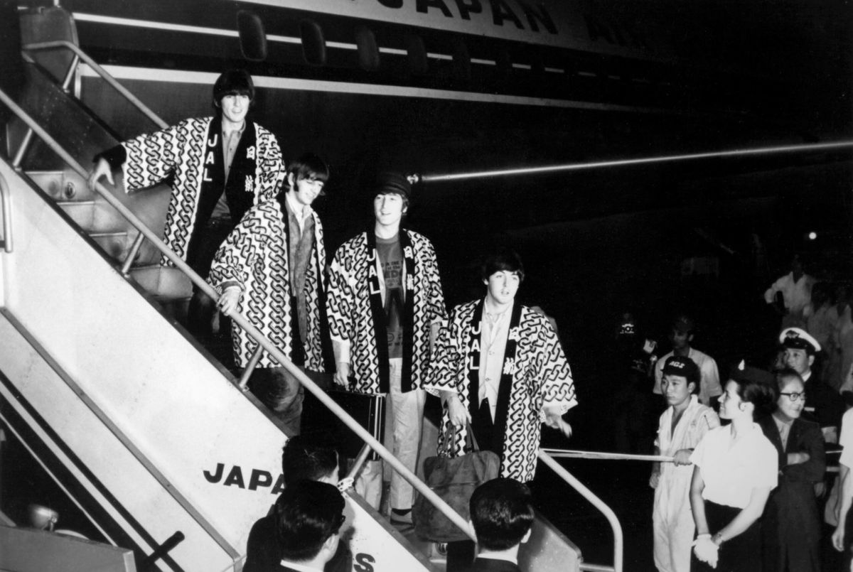 The Beatles arrive at Tokyo's airport for their brief tour of Japan in 1966.