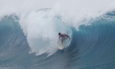 Australian surfer Jack Robinson rides a wave during the men's final of the Tahiti World Surf League (WSL) professional competition