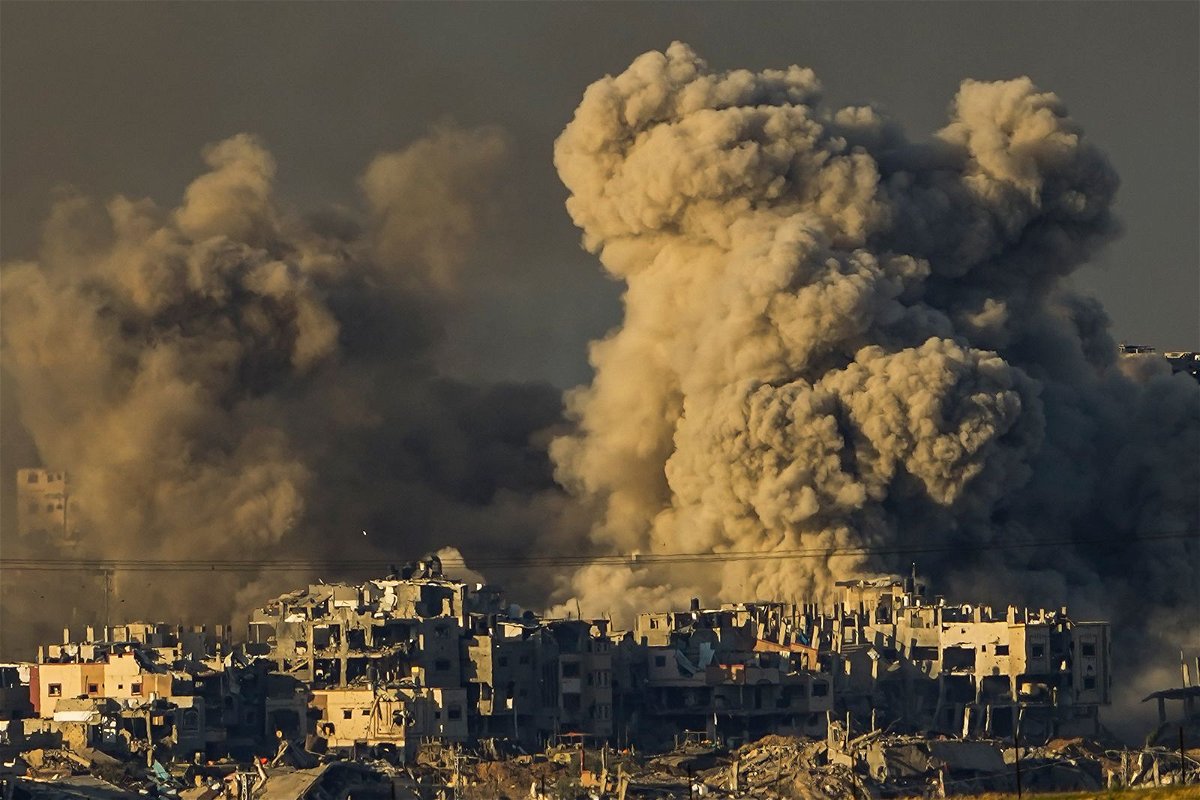 <i>Ariel Schalit/AP</i><br/>Smoke rises following an Israeli bombardment in the Gaza Strip
